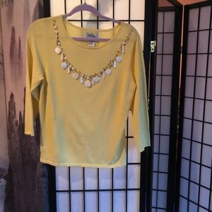 Bob Mackie yellow sweater with decoration.